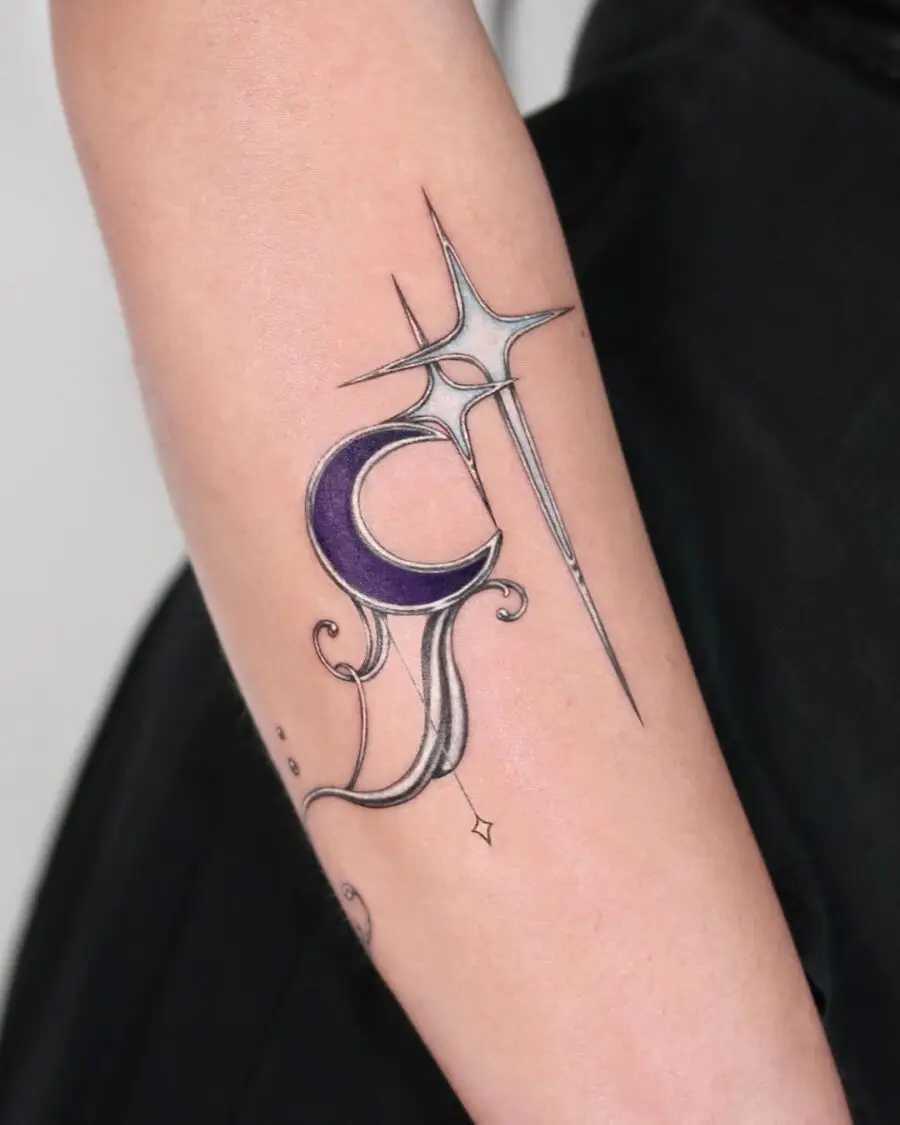 Elegant celestial tattoo featuring moon and star motifs