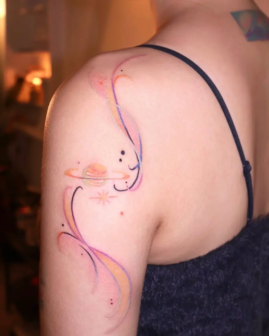 Delicate celestial tattoo with vibrant cosmic colors