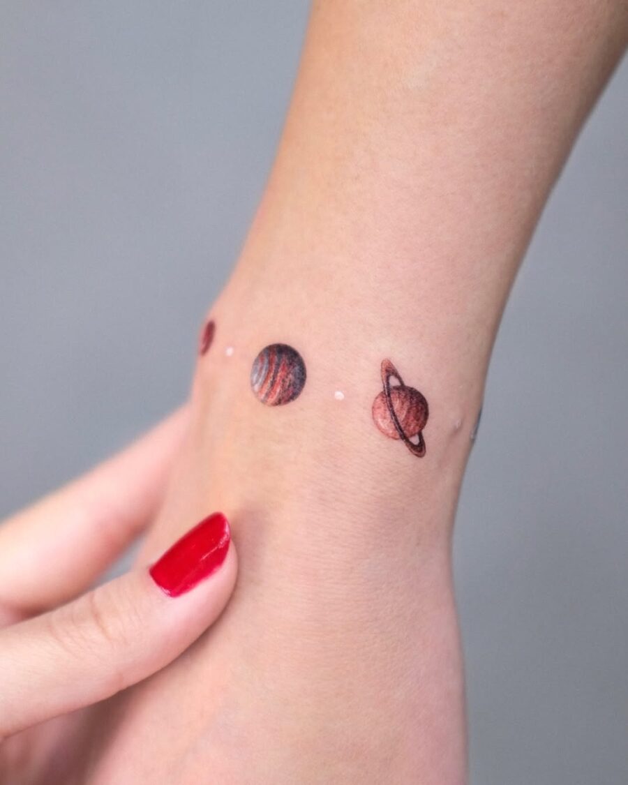 Charming Planets Tattoo on the Wrist