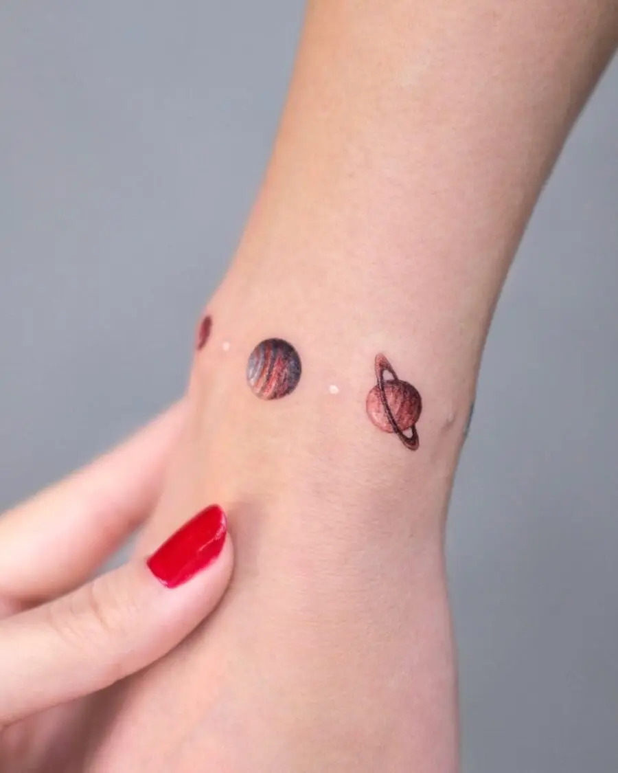 Charming Planets Tattoo on the Wrist