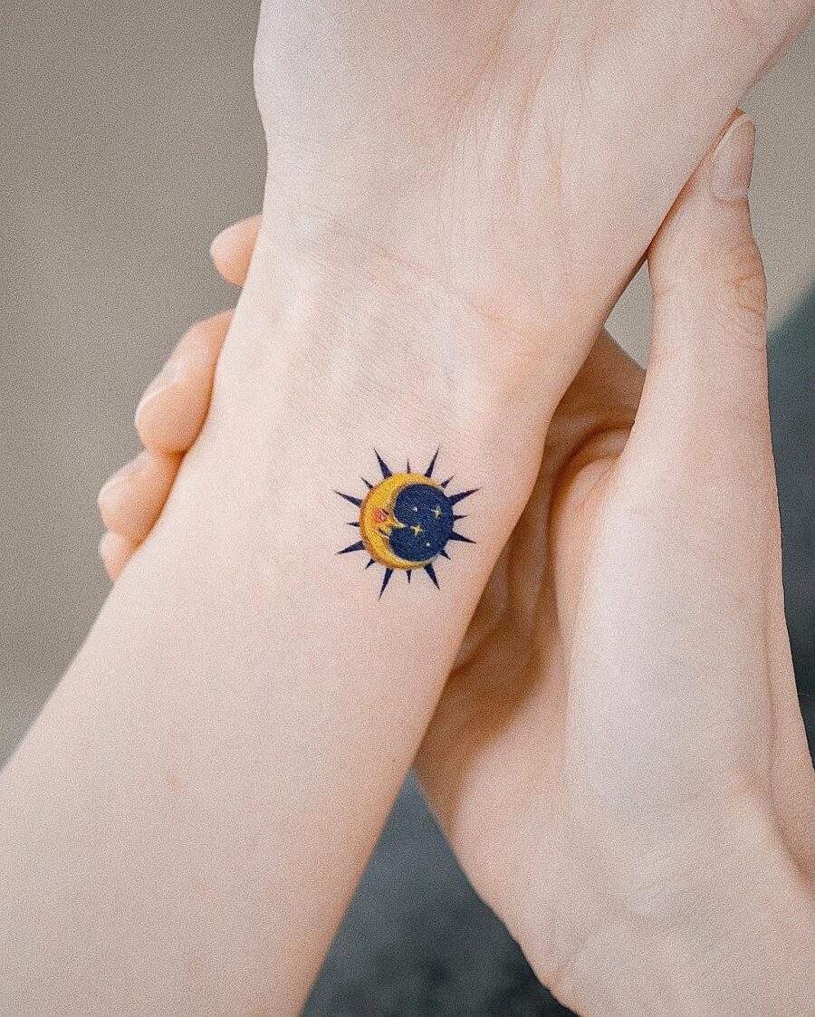 A celestial sun and moon tattoo for harmony