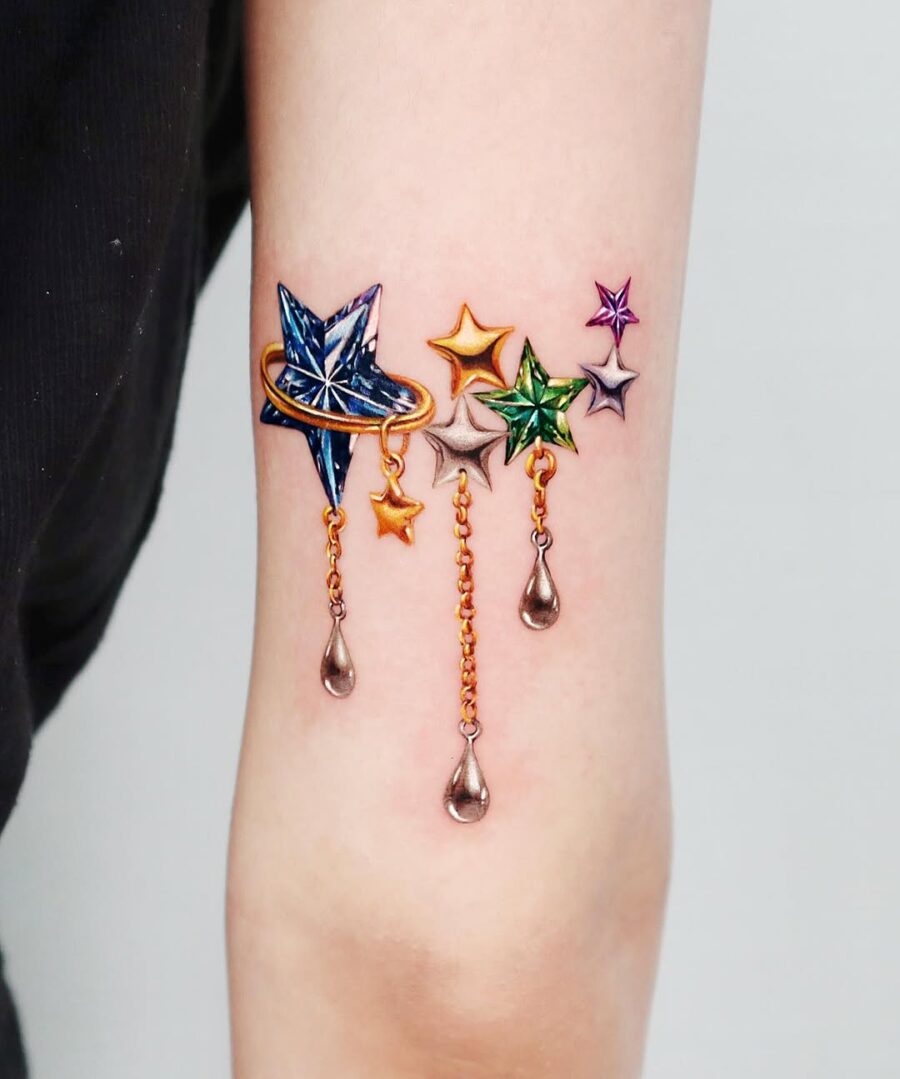 Vibrant Fantasy Stars and Celestial Elements Tattoo