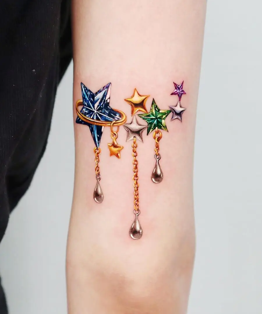 Vibrant Fantasy Stars and Celestial Elements Tattoo