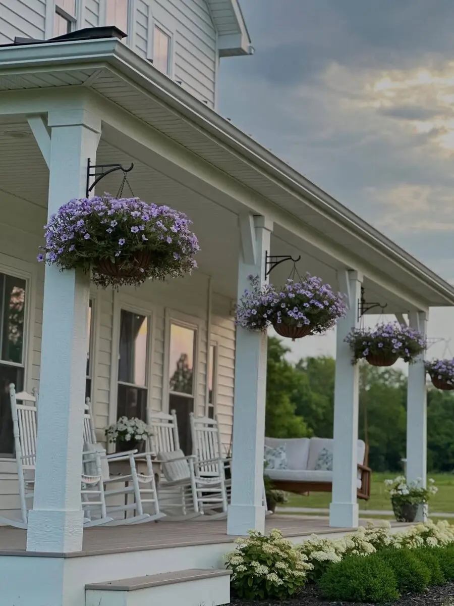 Charming porch with hanging flower baskets