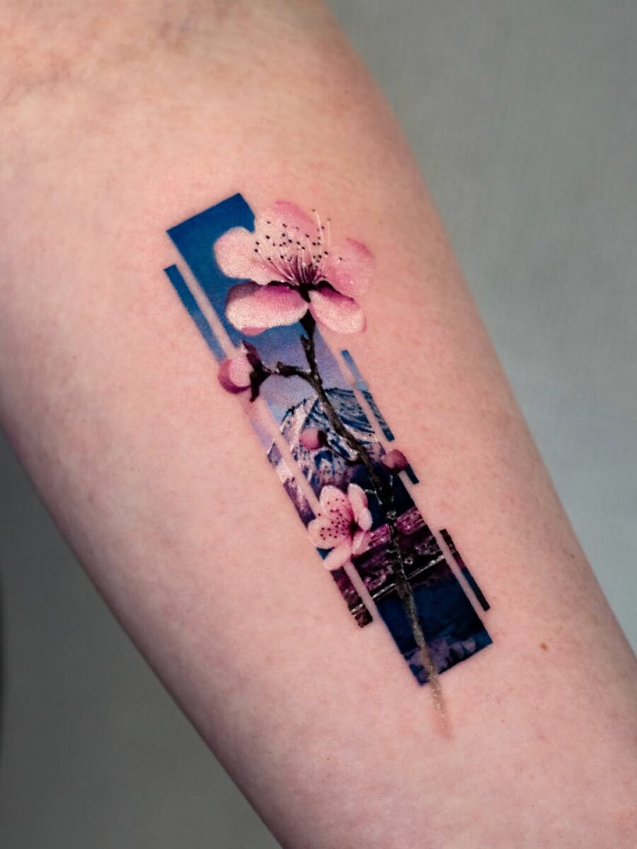 Stunning minimalist cherry blossom tattoo design