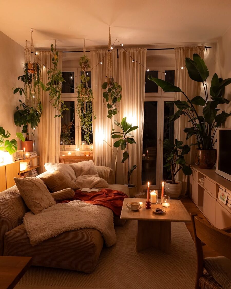 Cozy Living Room with Lush Greenery and Warm Lighting