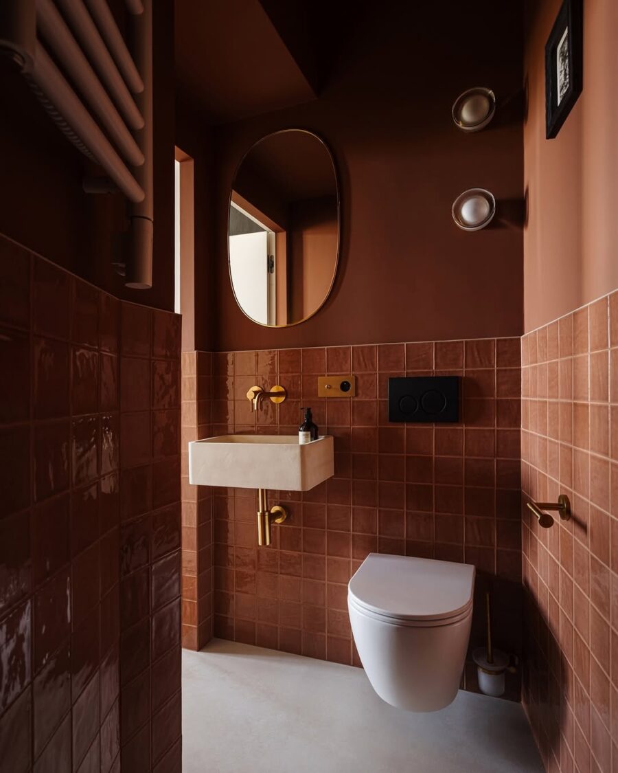 Warm earth tones enhance cozy bathroom vibes