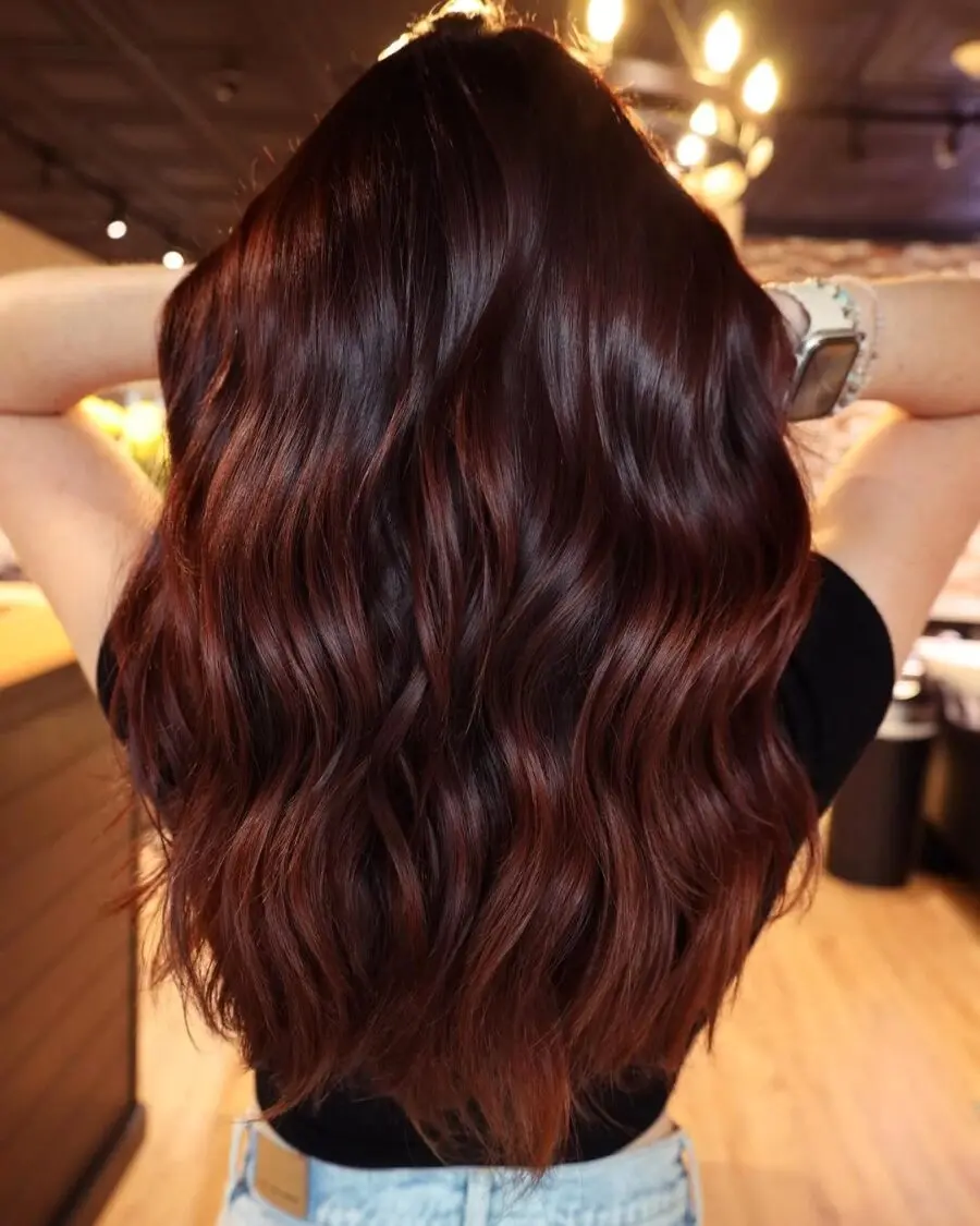 Gorgeous long wavy chocolate cherry hairstyle