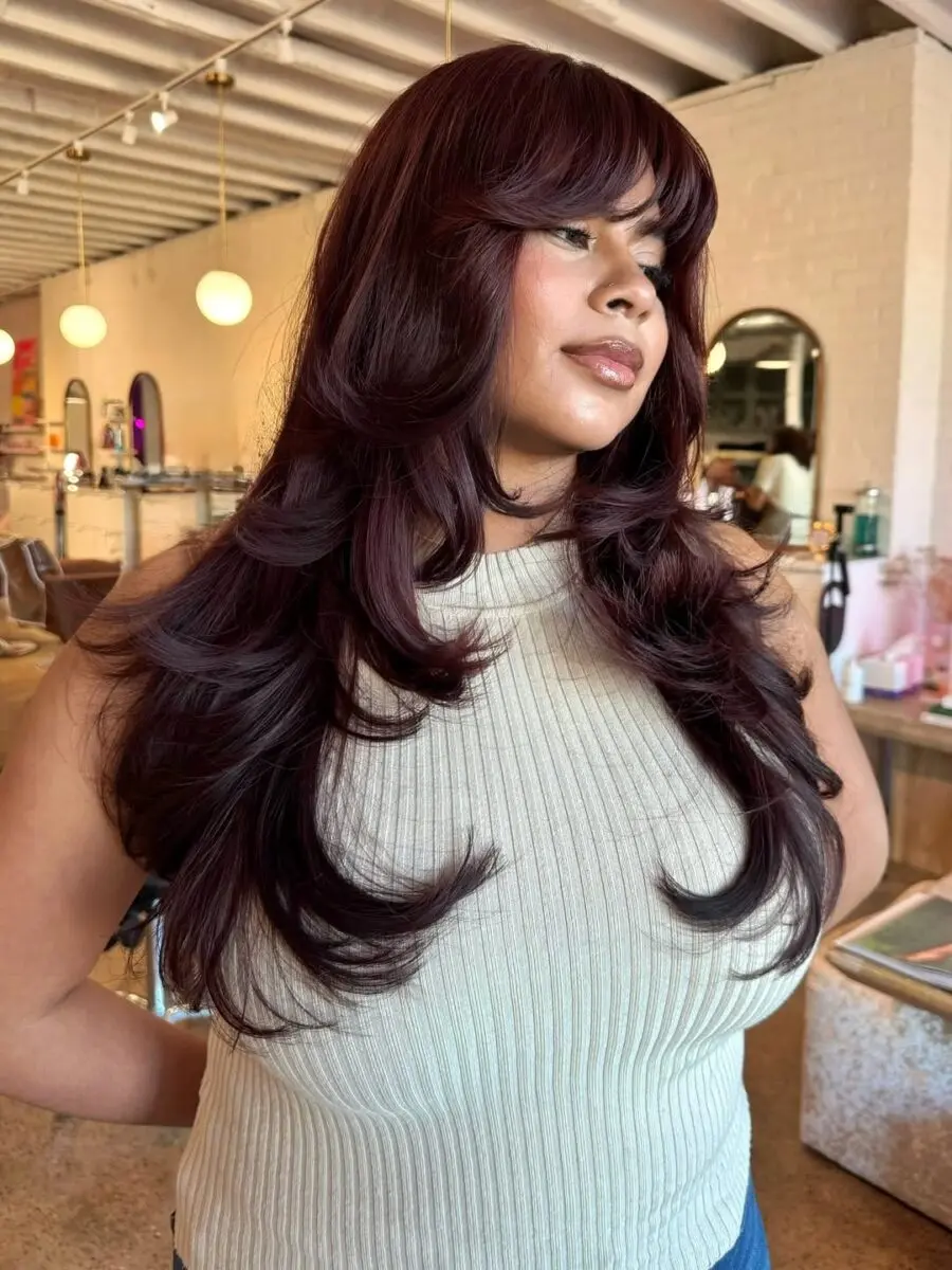 Chic chocolate cherry hairstyle with bangs