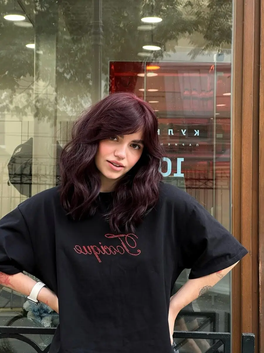 Chic chocolate cherry hairstyle with soft waves
