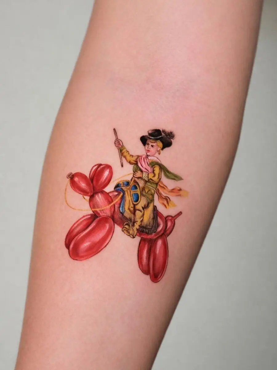 Whimsical balloon dog tattoo featuring a playful boy