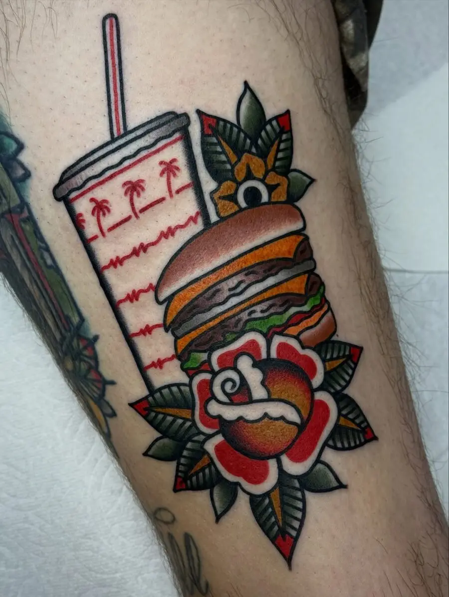 Playful burger tattoo with vibrant layers