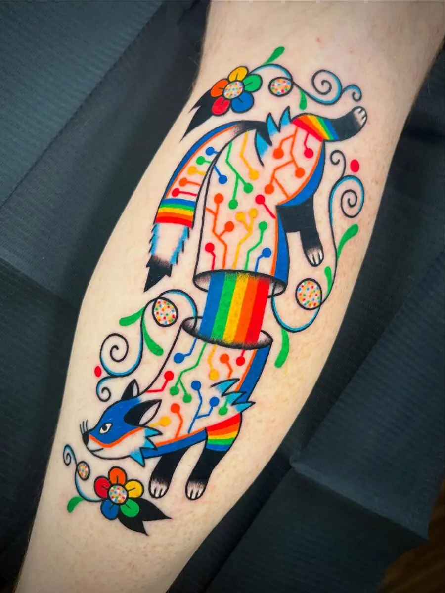 Vibrant circuitry cat tattoo with floral elements