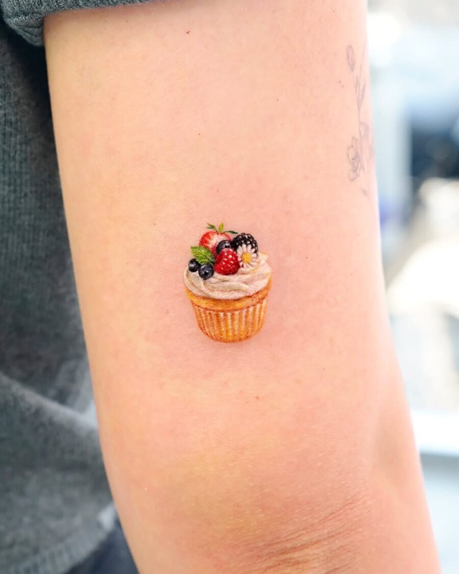 Delightful cupcake tattoo brings sweetness to skin
