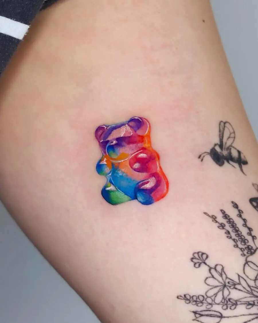 Colorful gummy bear tattoo exuding playfulness