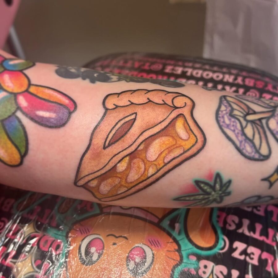 Delicious slice of pie tattoo on arm