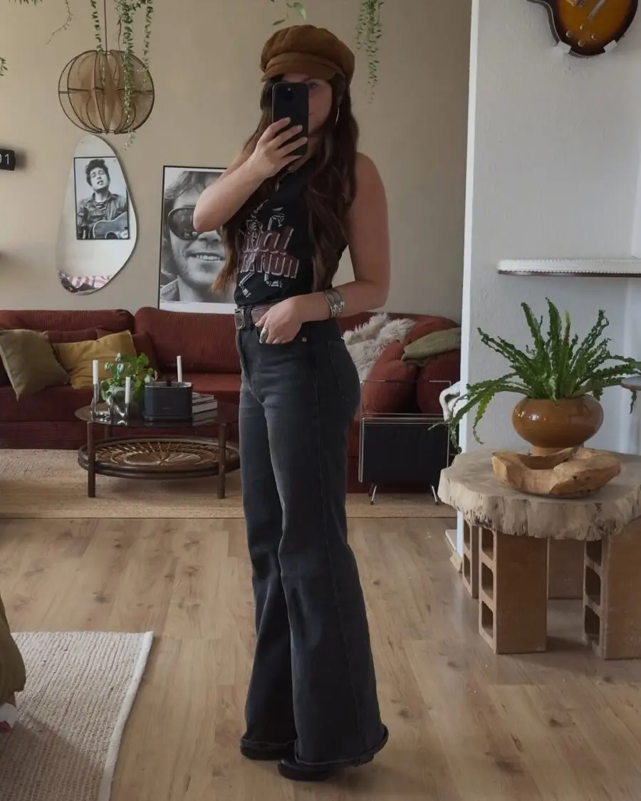 Retro-inspired outfit with flared denim and band tee