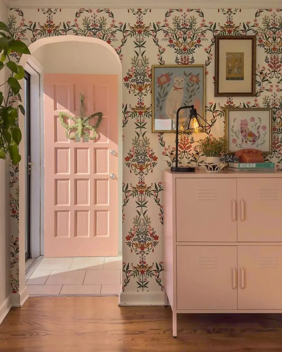 Charming entryway with floral wallpaper accents