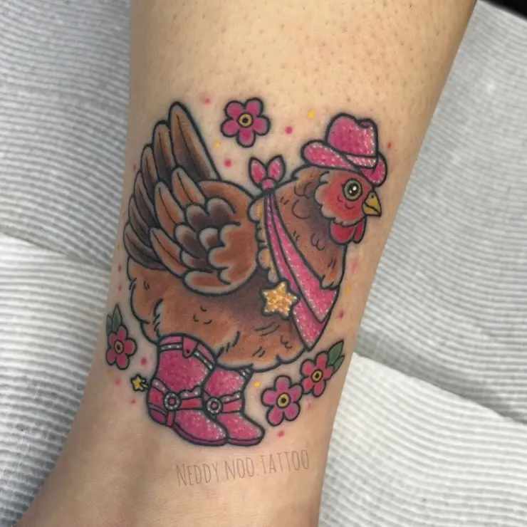 Charming hen in pink boots and hat