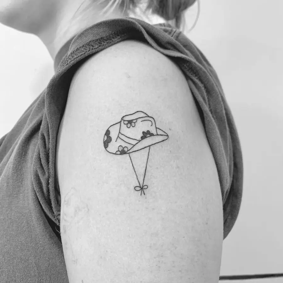 Charming floral country girl hat tattoo design