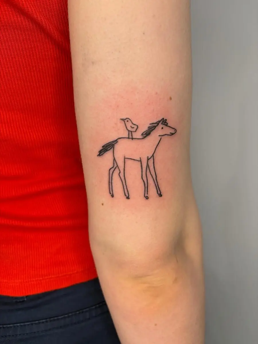 Minimalist horse and bird tattoo design