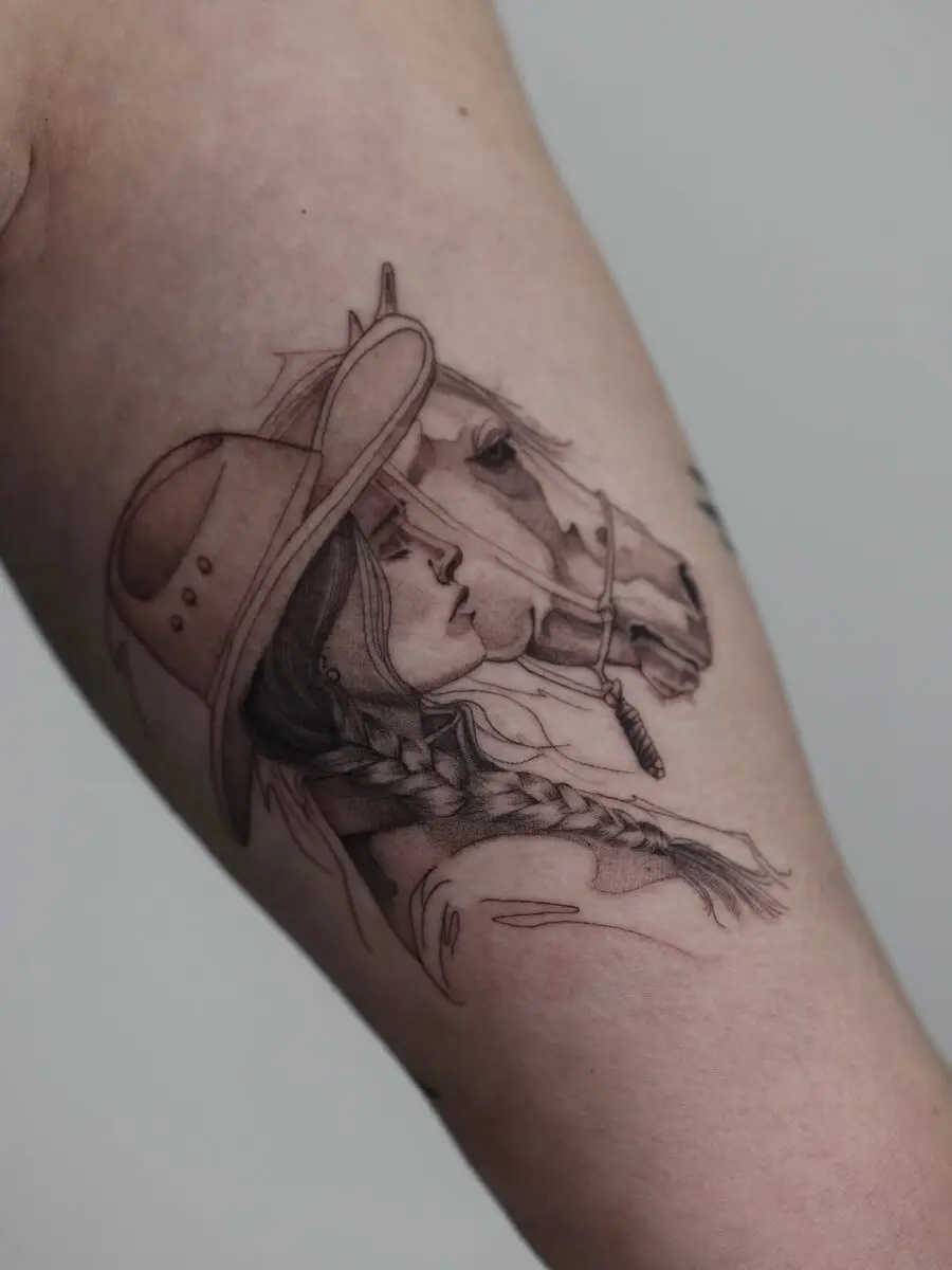 Stylish tattoo of a girl with a horse
