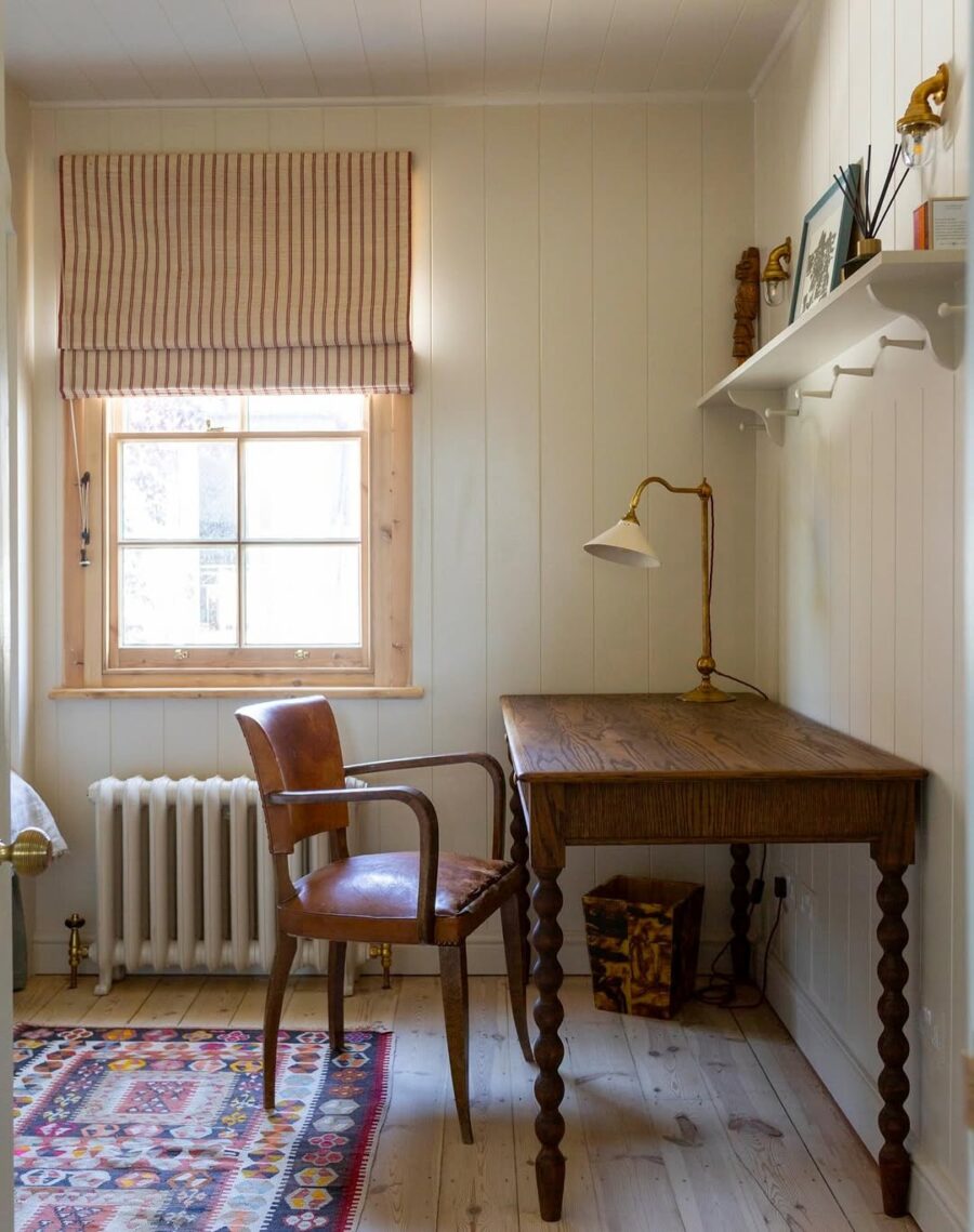 Charming corner desk with rustic decor elements