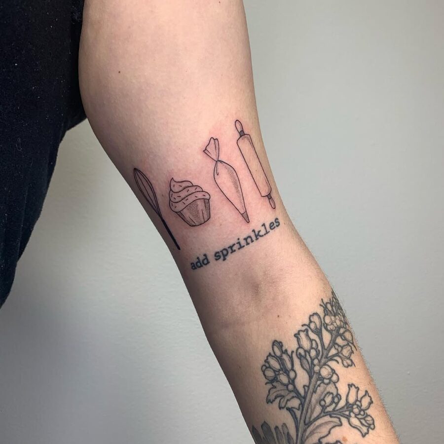 Charming cupcake tattoo celebrates baking joy