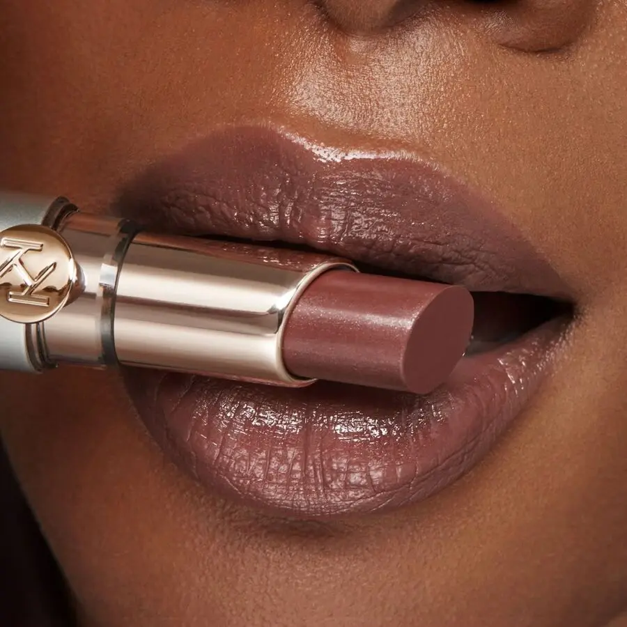 Flattering nude brown lipstick for dark skin