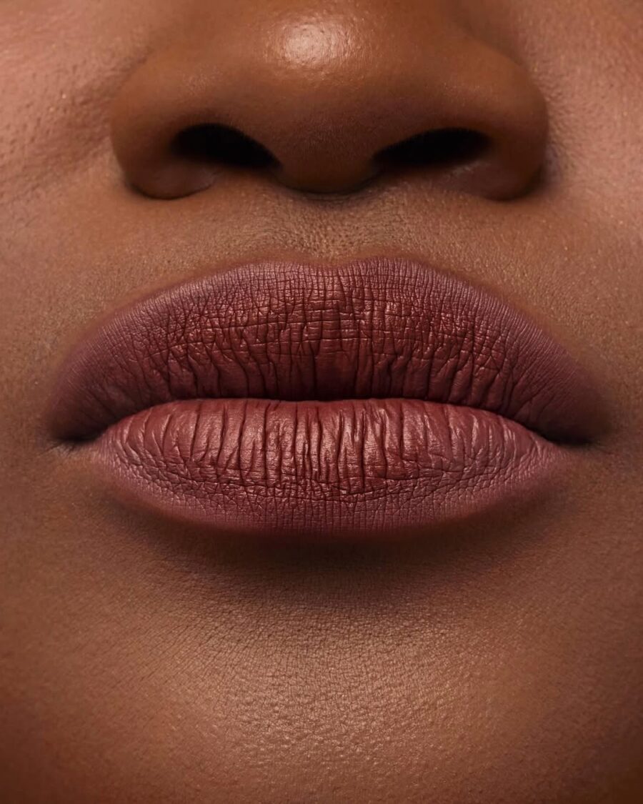 Matte nude brown lipstick for dark skin.