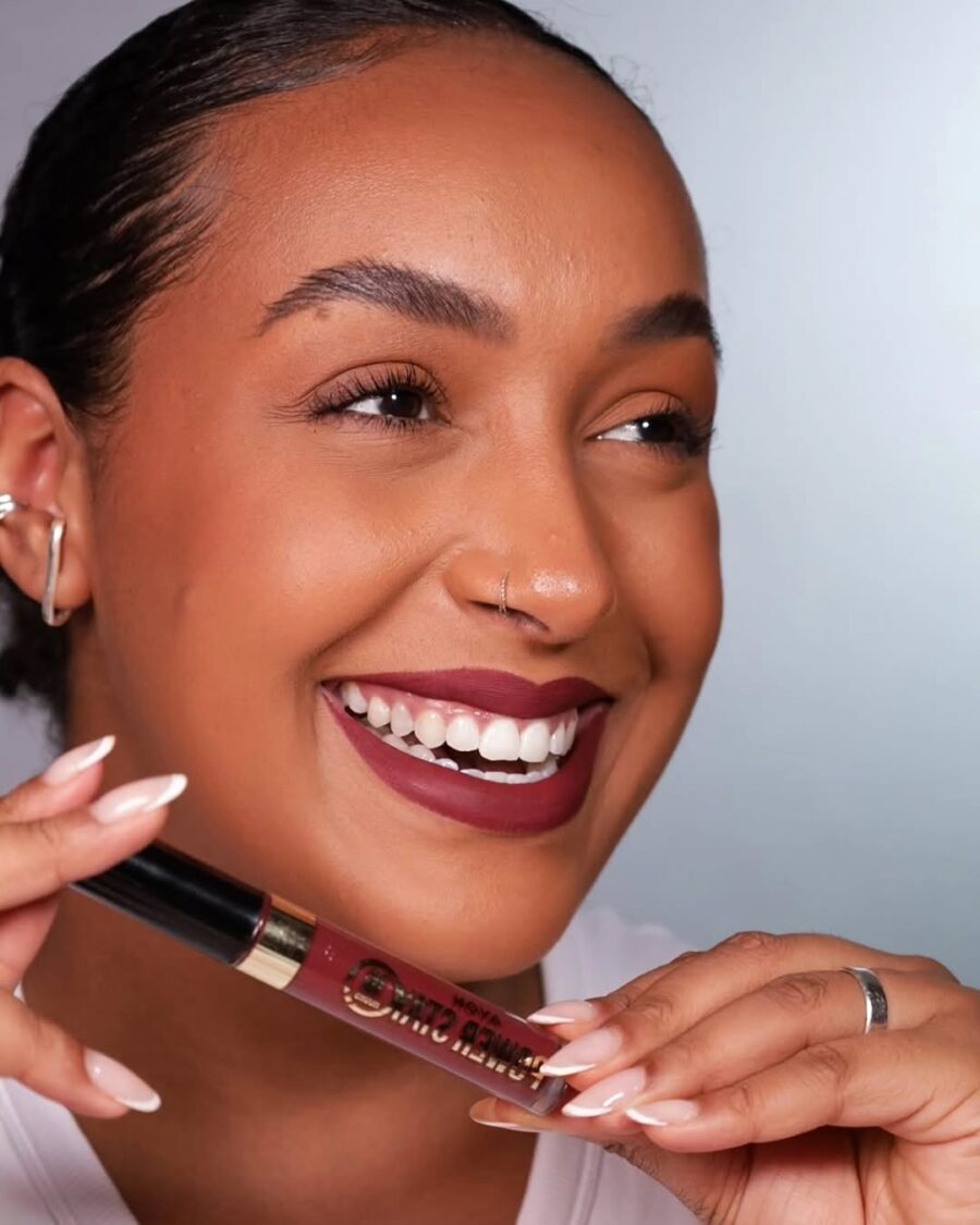 Vibrant burgundy lipstick on dark skin