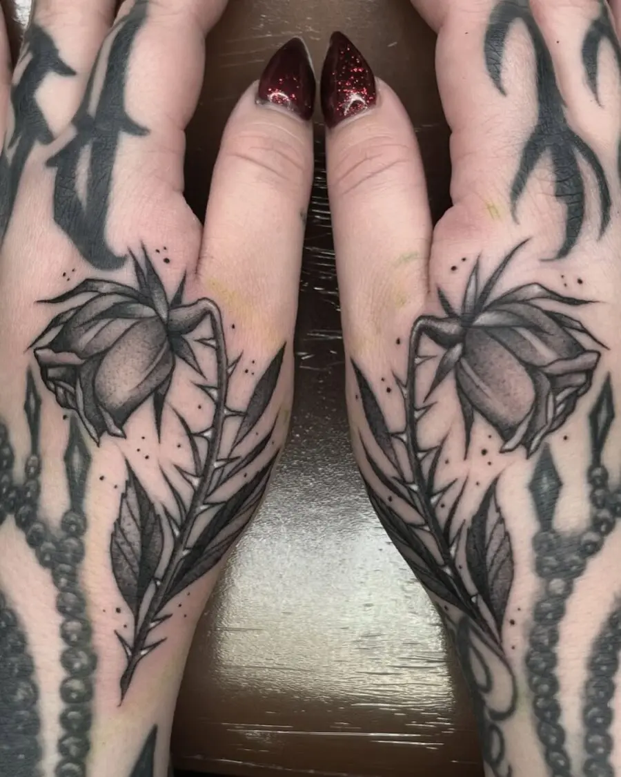Elegant dead roses on hands create striking contrast