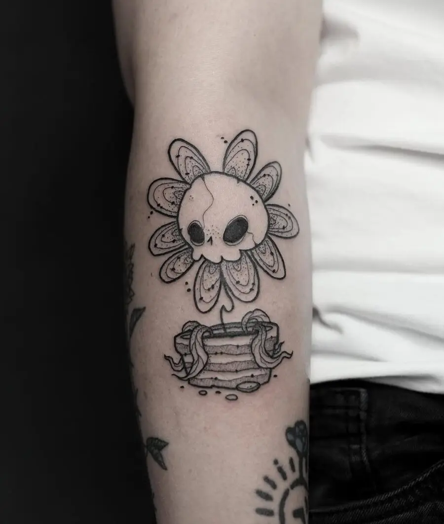 Unique skull flower tattoo with layered details
