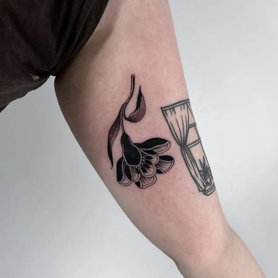Elegant dead flower tattoo showcasing delicate details