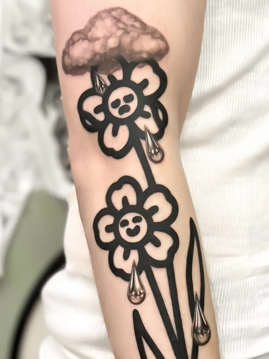 Expressive dead flower tattoo with charm