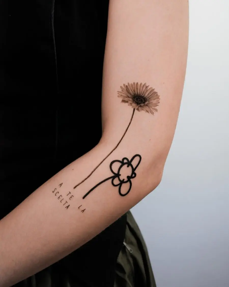 Minimalist dead flower tattoo with elegant lines