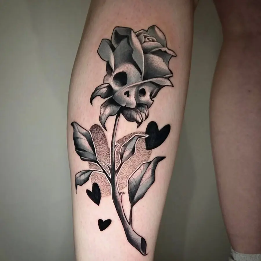 Unique skull rose tattoo with hearts detail