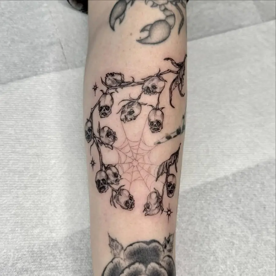 Intricate skulls entwined with delicate blooms