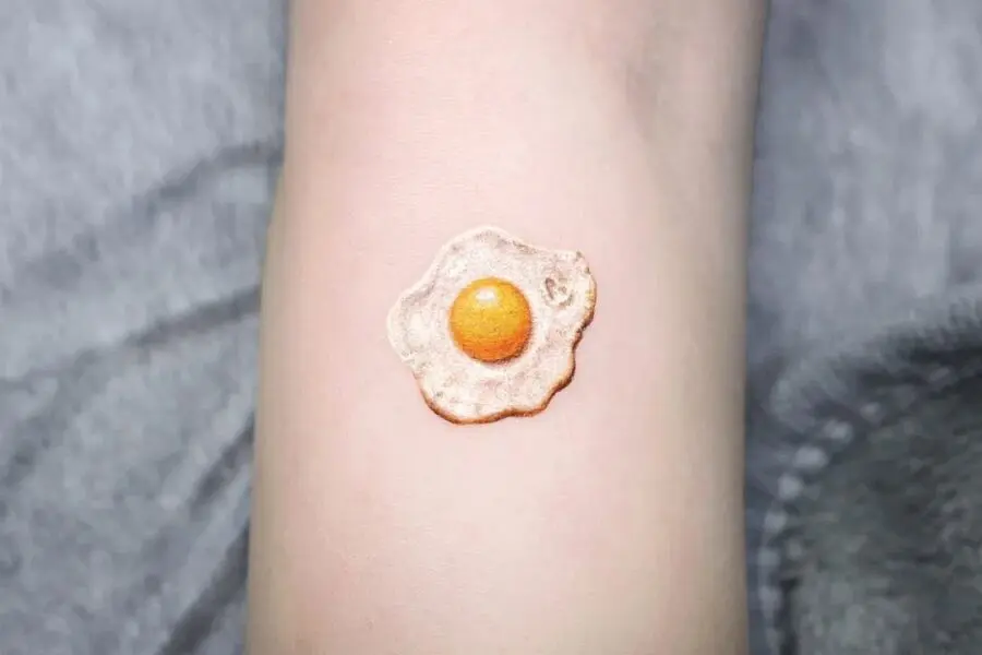 Unique Fried Egg Tattoo Design on Skin