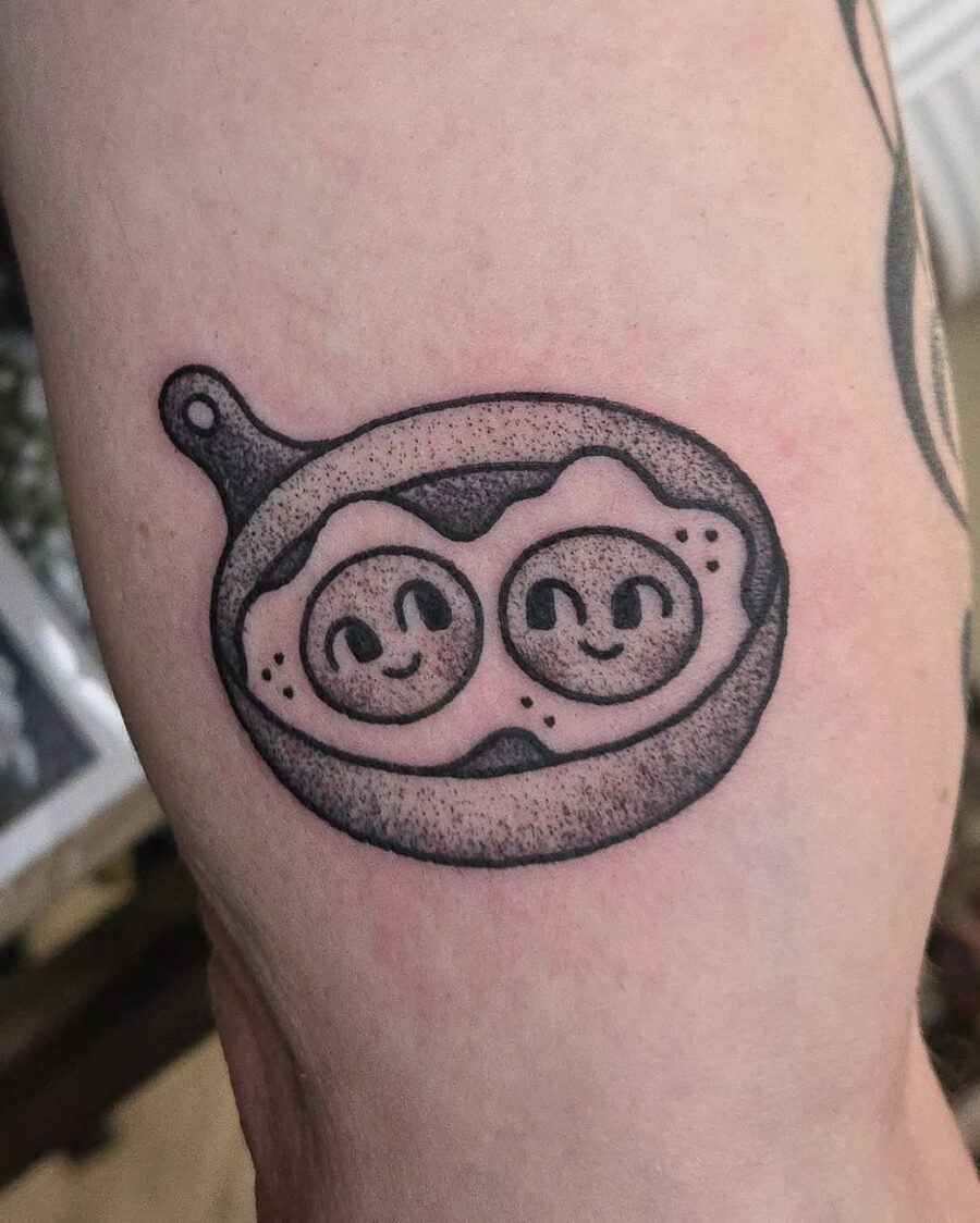 Cute egg tattoo with smiling faces