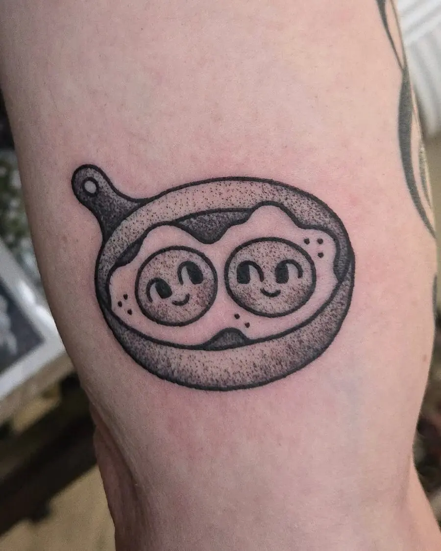 Cute egg tattoo with smiling faces