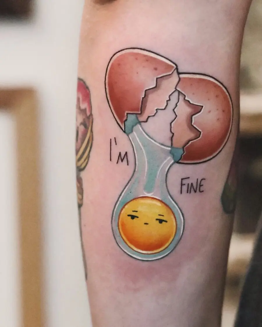 Playful egg tattoo with a humorous twist