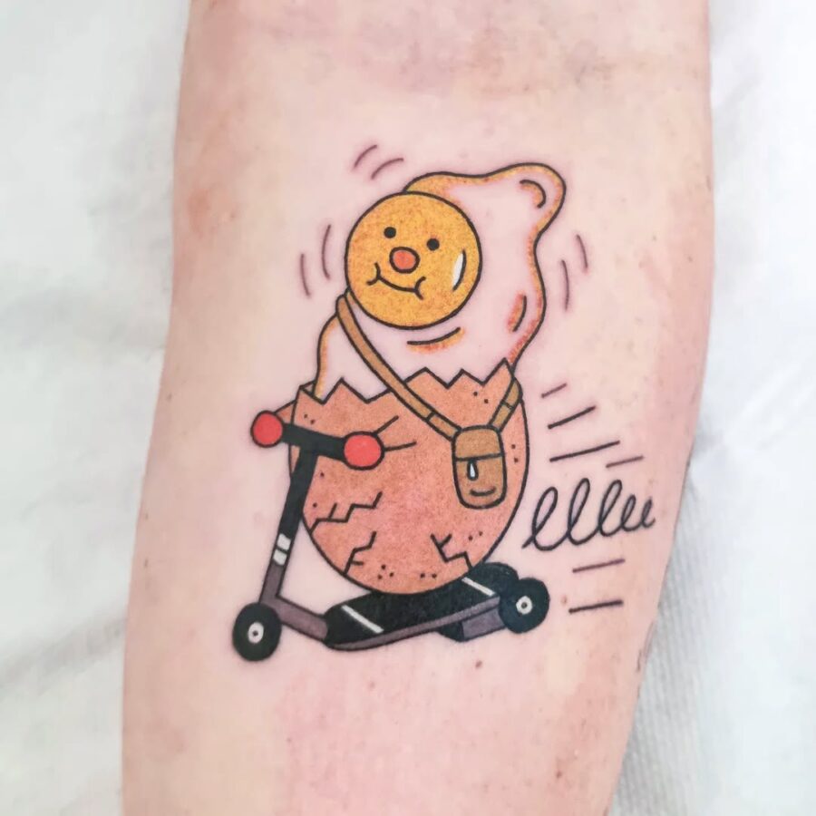 Playful egg tattoo on a scooter design