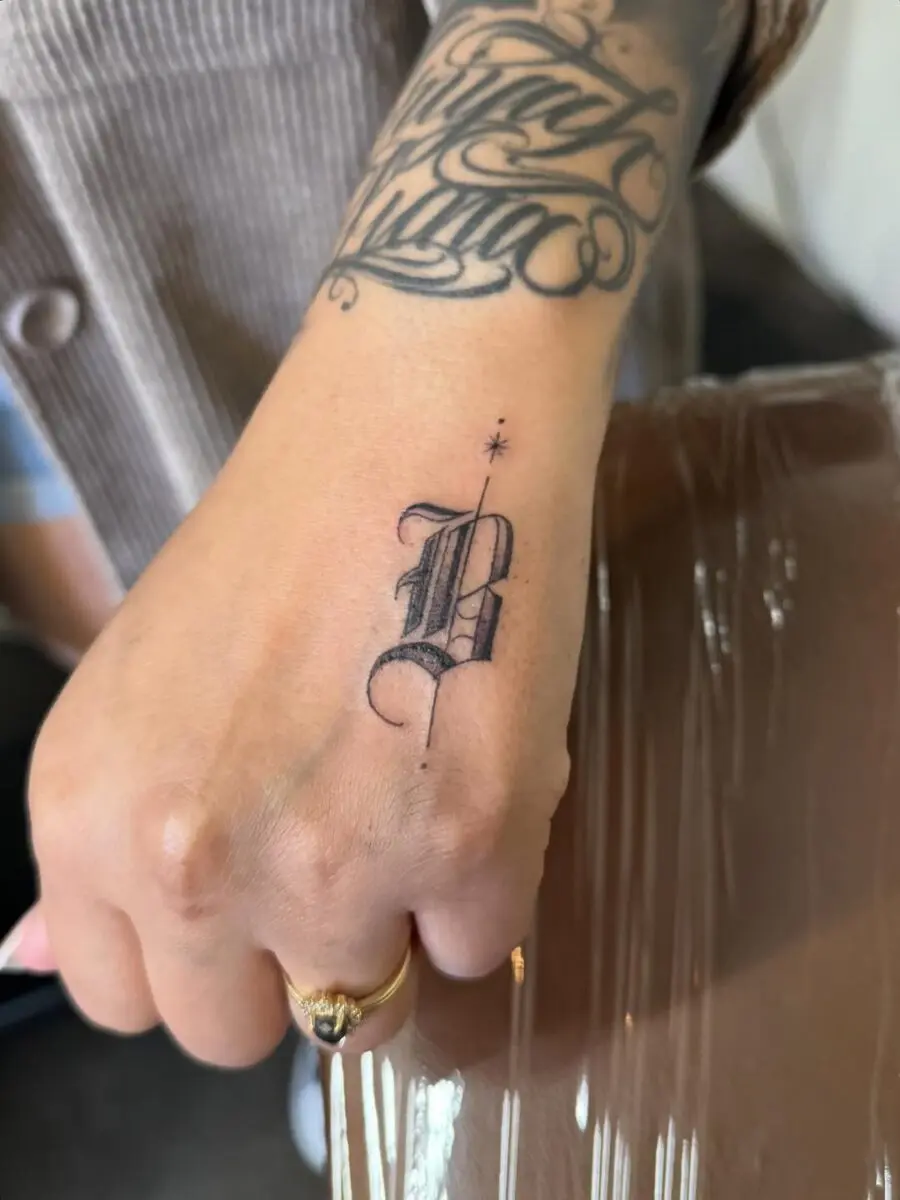 Stylish and bold letter B tattoo design