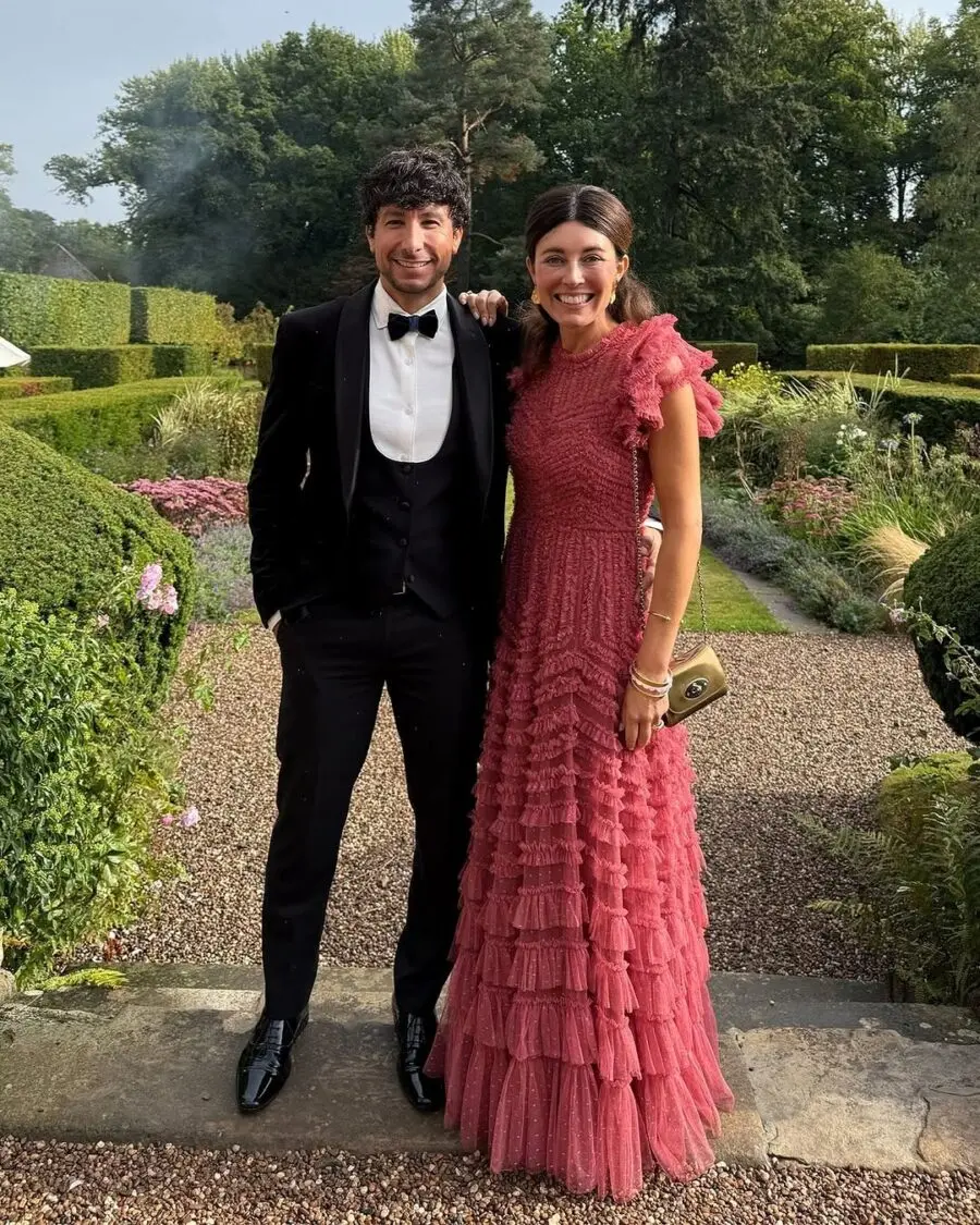 Stylish couple in summer wedding attire