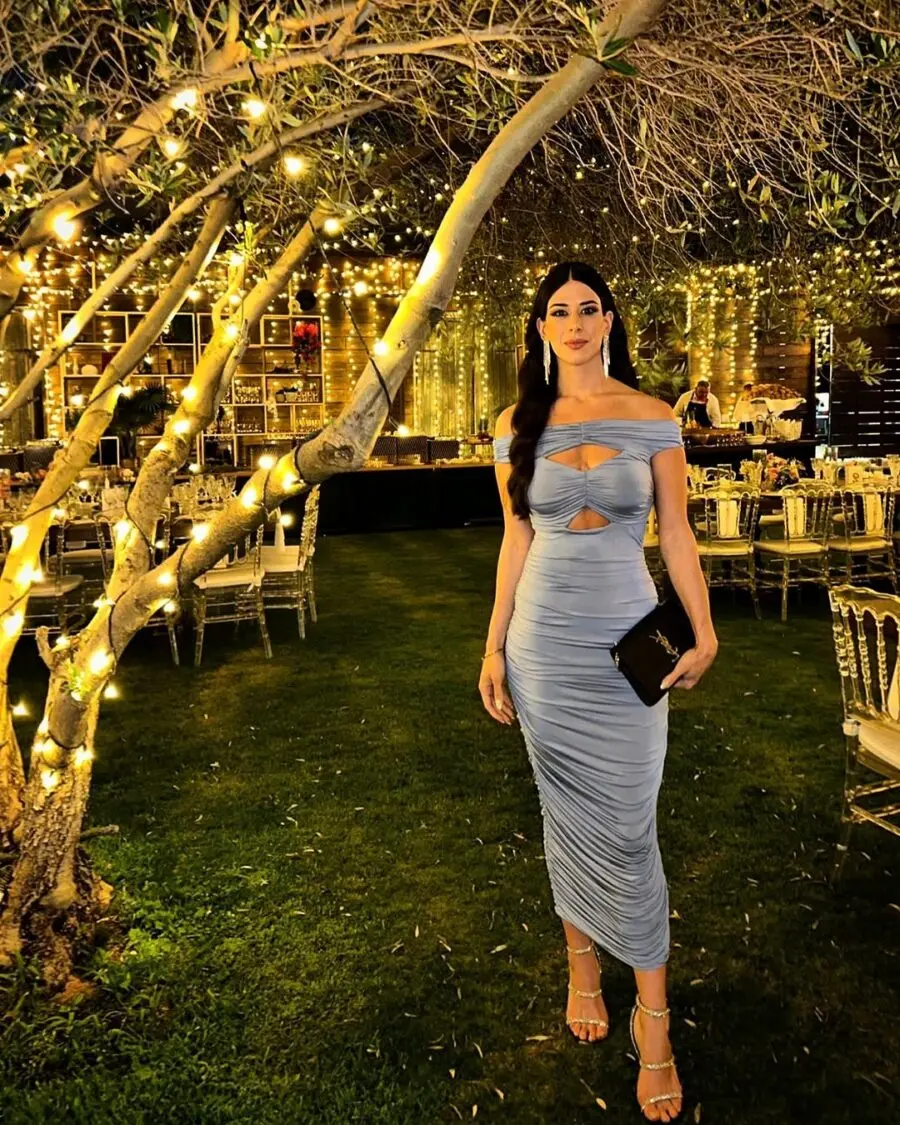 Chic summer wedding guest attire in light blue