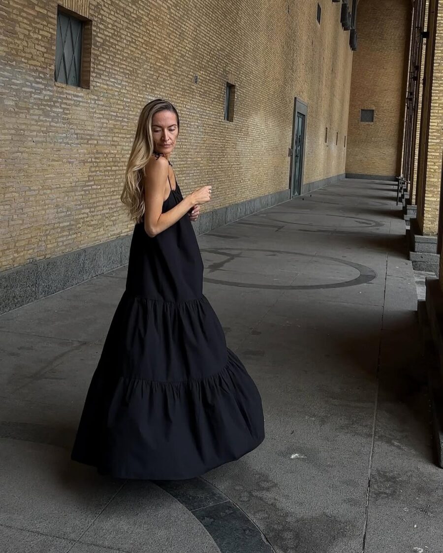 Chic long black dress for stylish outings
