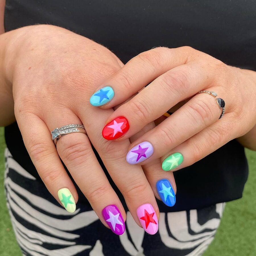 Bright and playful festival nails with star designs