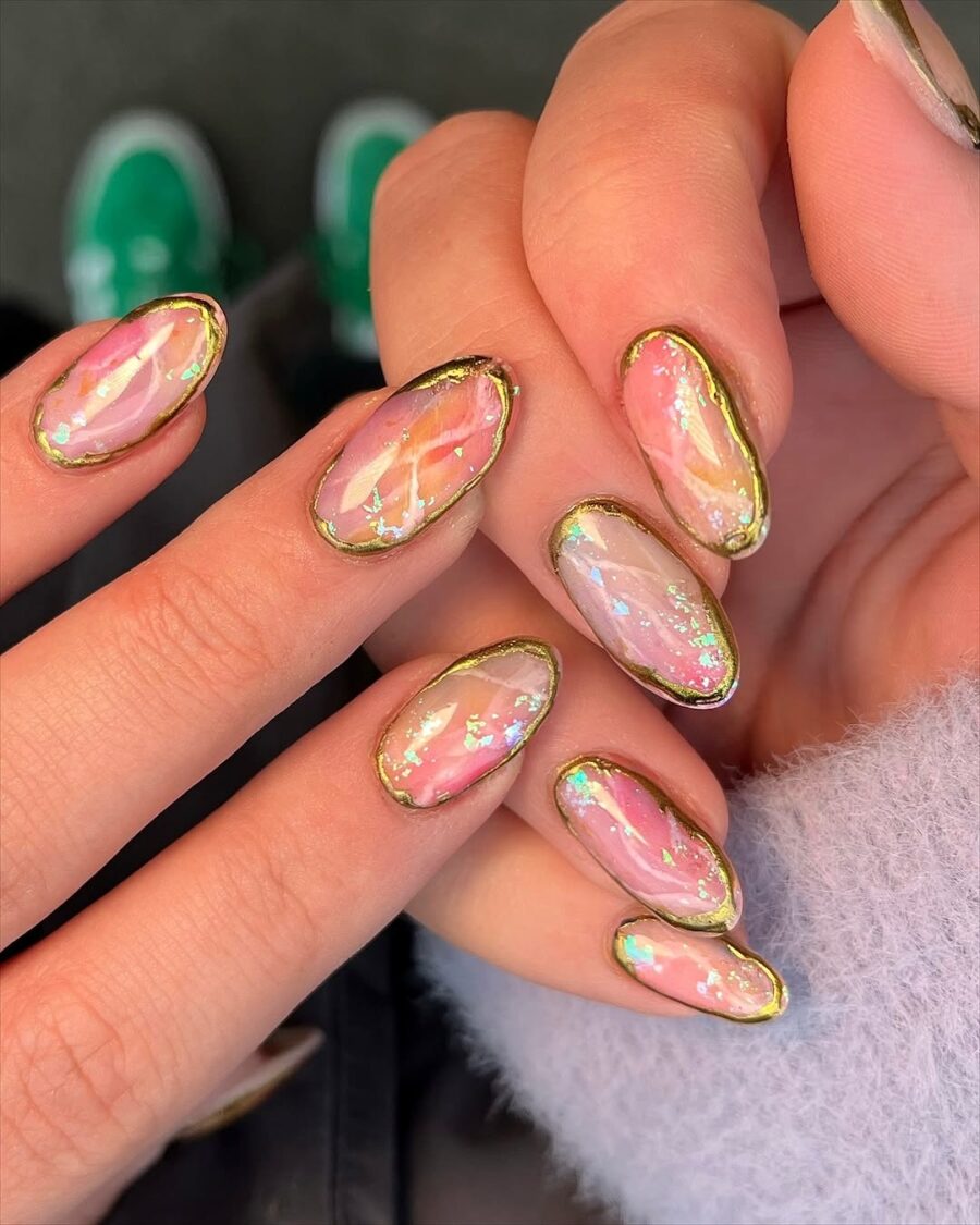 Vibrant pink and gold nail art inspiration