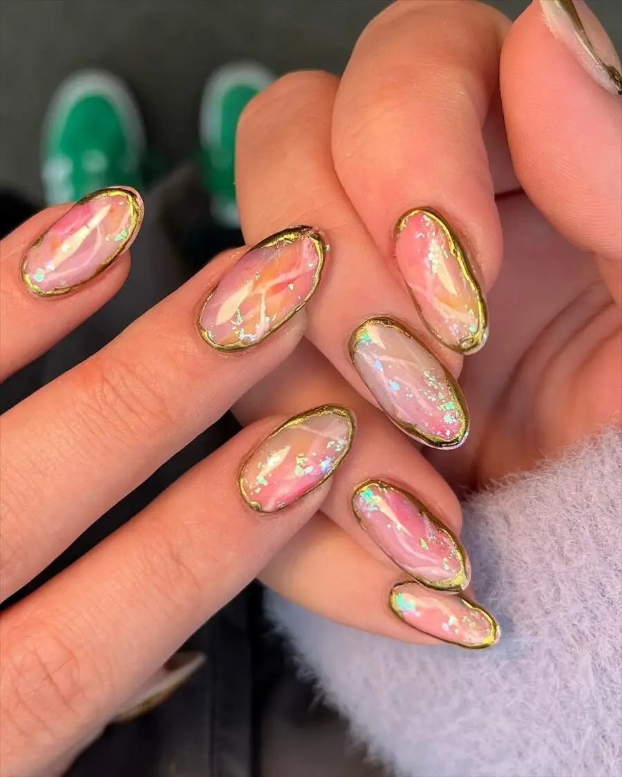 Vibrant pink and gold nail art inspiration